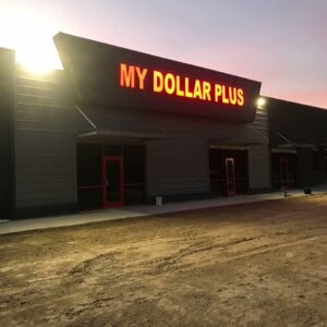 My Dollar Plus Store front at night